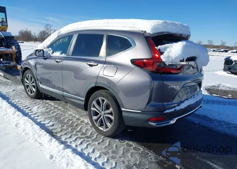 2020 Honda Cr-V Touring z USA, uszkodzony, nr VIN 7FART6H97LE002018